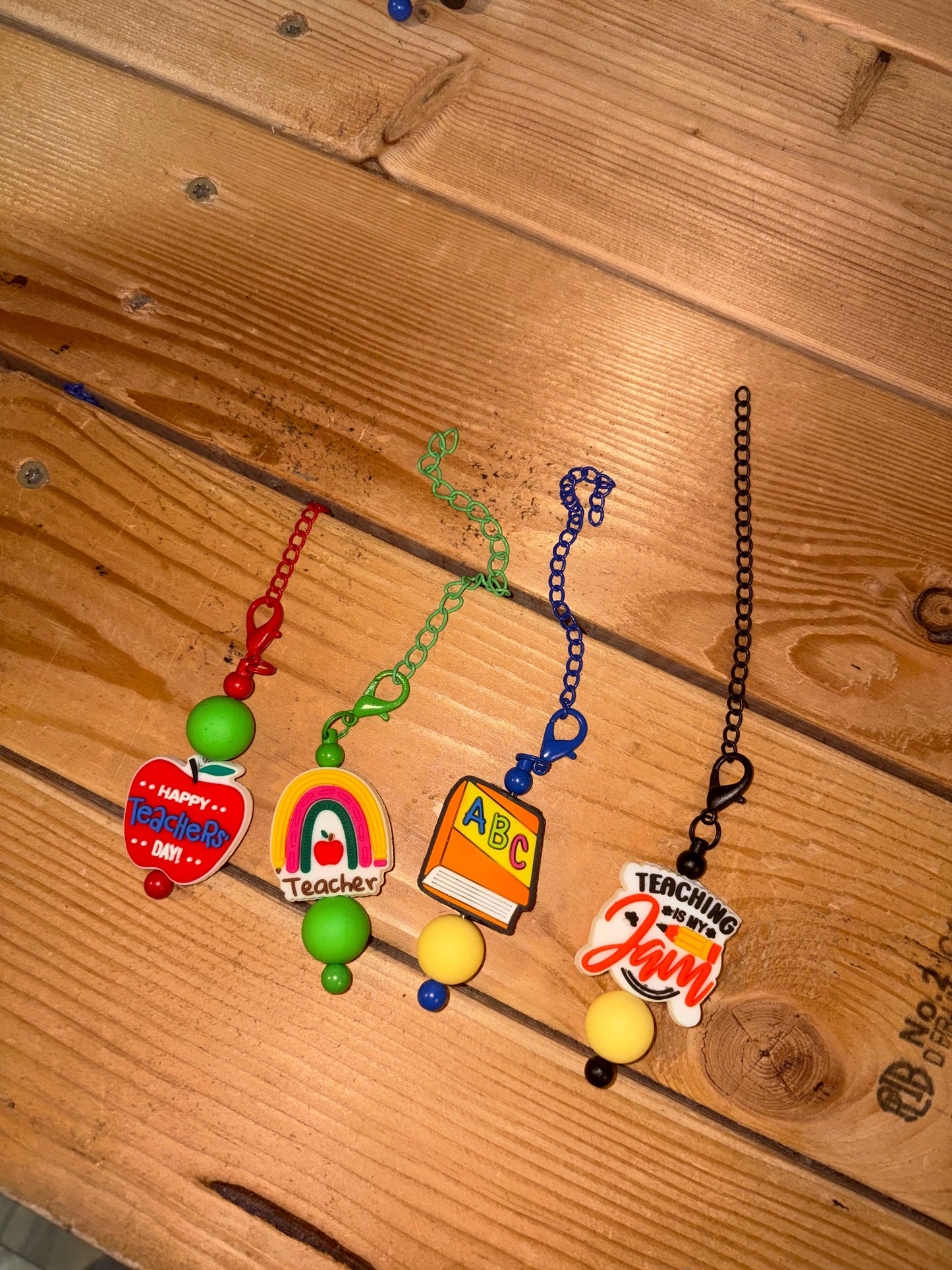 Teacher bag/tumbler charms. (Number order left to right.)